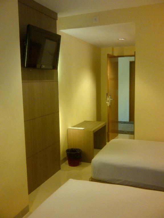Amans Hotel Ambon Rum bild